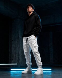 Young_Man_Wearing_Black_Hoddie_and_White_Bottom